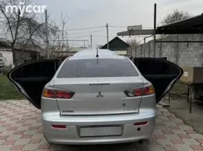 фото Mitsubishi Lancer 2010 года с пробегом за 3850000 тенге в undefined - фото 4