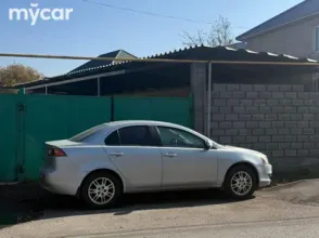 фото Mitsubishi Lancer 2010 года с пробегом за 3850000 тенге в undefined - фото 4