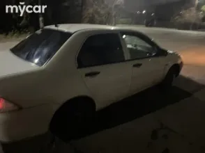 фото Mitsubishi Lancer 2010 года с пробегом за 2500000 тенге в undefined - фото 4