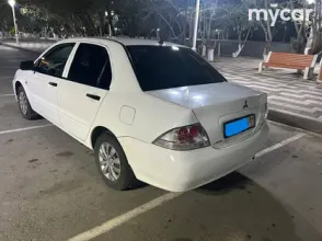 фото Mitsubishi Lancer 2010 года с пробегом за 2500000 тенге в undefined - фото 2